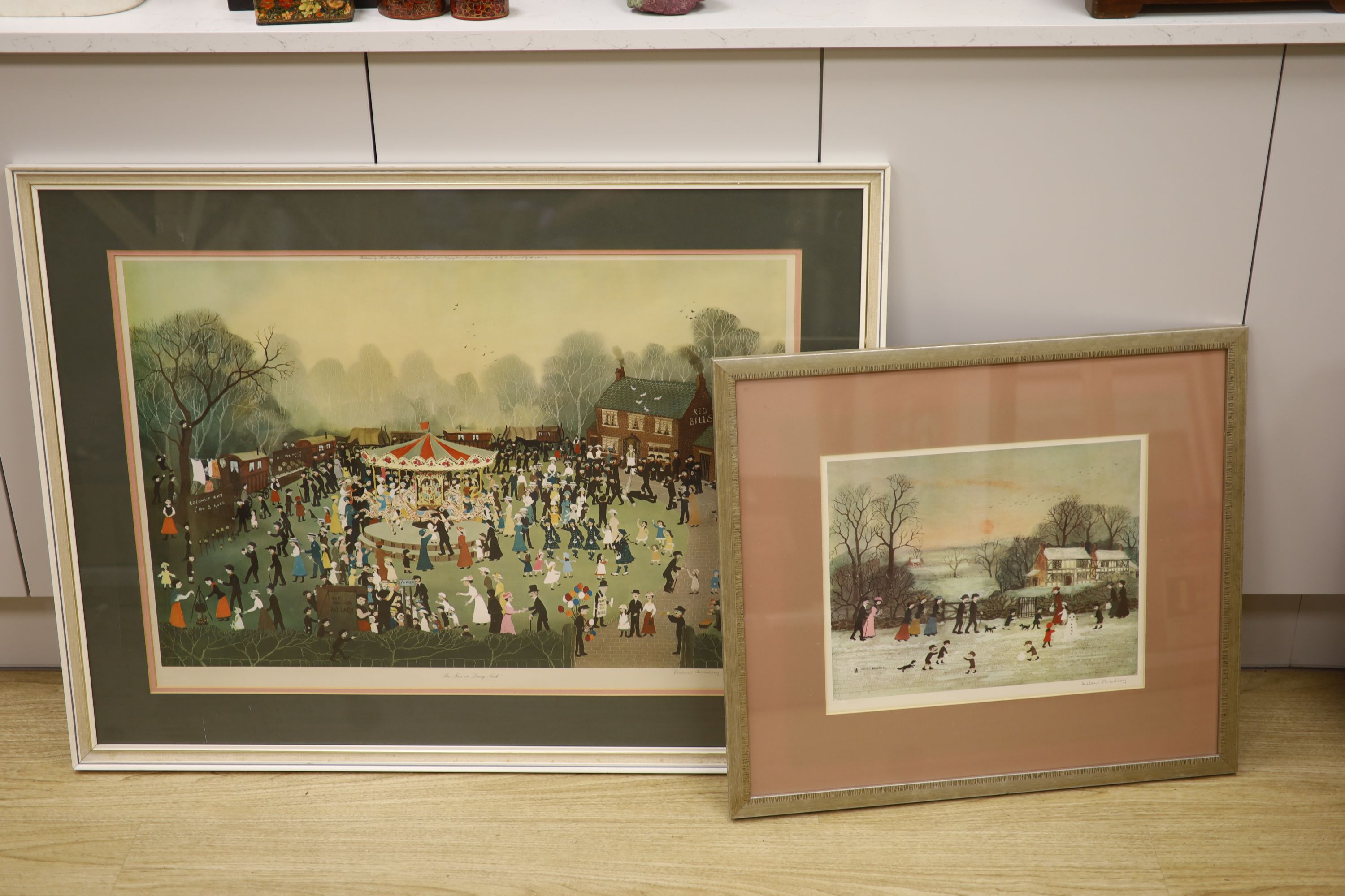 Helen Bradley, two signed prints, The Fair at Daisy Nook and Gathering Holly, 53 x 78cm and 31 x 39cm